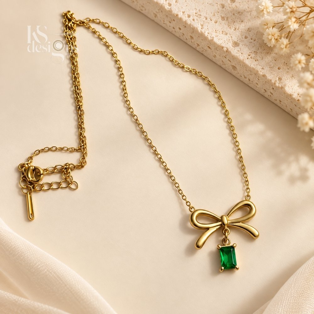 Golden Bow Necklace with Emerald Charm Golden Bow Necklace with Emerald Charm